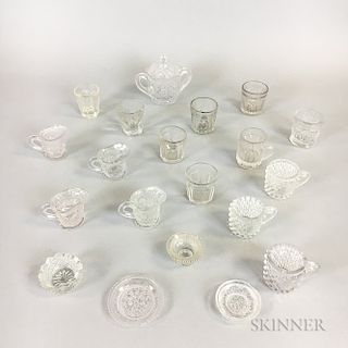 Twenty Miniature Colorless Pressed Glass Items.  Estimate $150-250