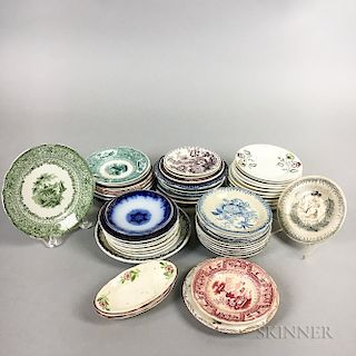 Approximately Fifty-two Staffordshire Transfer-decorated Cup Plates.  Estimate $150-250