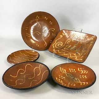 Five Slip-decorated Redware Pottery Dishes