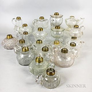 Twenty Colorless Glass Hand Lamps