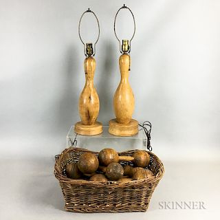 Pair of Maple Bowling Pin Lamps, a Basket, and Eight Turned Wood Dumbbells.  Estimate $150-250