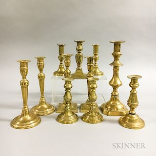 Eleven Brass Candlesticks
