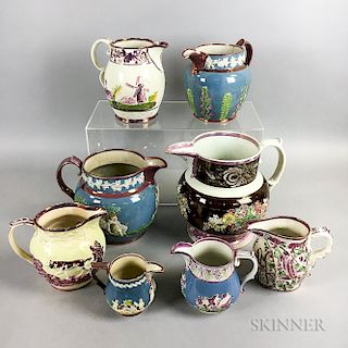 Eight Staffordshire Pink Lustre Relief-molded Jugs
