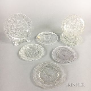 Seven Sandwich Colorless Pressed Glass Cup Plates