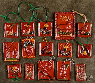 Fifteen Shooner redware Christmas ornaments.