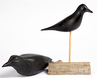 Two carved and painted crow decoys