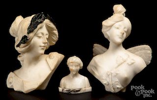 Three carved marble female busts