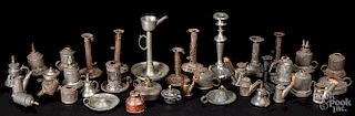 Large collection of pewter and tin lighting
