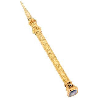 A sapphire and diamond 18K yellow gold mechanical pencil.