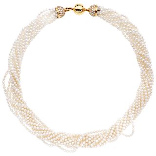 A cultured pearl necklace with diamond 18K yellow gold clasp.