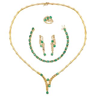 An emerald and diamond 14K yellow gold choker, bracelet, ring and pair of earrings set.