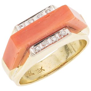 A coral and diamond 18K yellow gold ring.