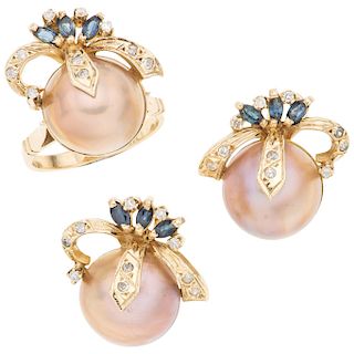 A half pearl, sapphire and diamond 14K yellow gold ring and pair of earrings set.