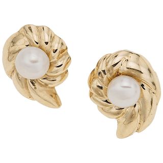 A cultured pearl 14K yellow gold pair of stud earrings.