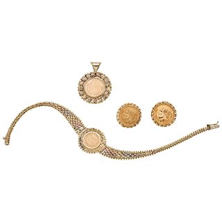 A 14K yellow, white and rose gold pendant, bracelet and pair of earrings with 21.6K yellow gold coins.