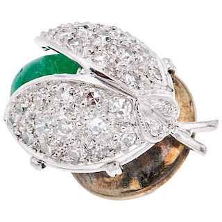 An emerald and diamond 14K white gold lapel pin.