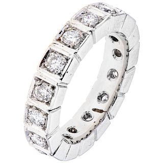 A diamond 14K white gold eternity ring.