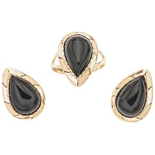 An onyx 14K yellow gold ring and pair of earrings set.