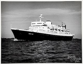 Four black and white passenger ship photographs