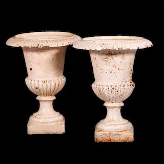 Pair of cast iron vase/capitals.