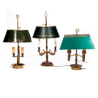 Three French Bouillotte lamps.