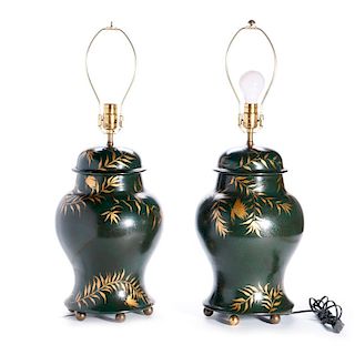 Pair of green and gilt painted lamps.