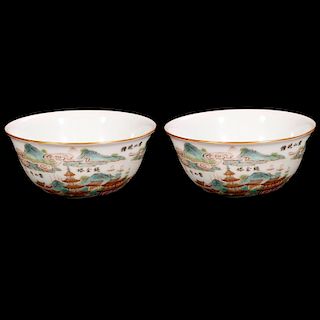 Pair of intricately painted Chinese tea cups.