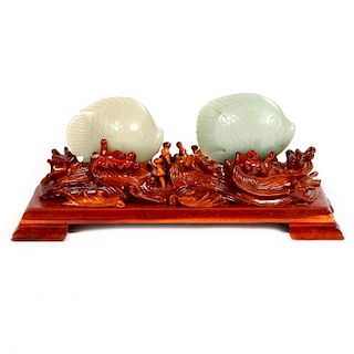 Two carved jade fish.