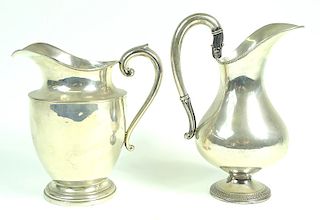 (2) Pair of Two Sterling Silver Water Pitchers