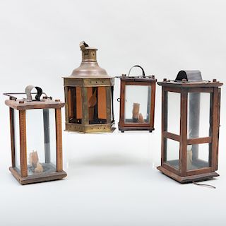 Group of Three Wood and Glass Lanterns and a Brass and Glass Lantern