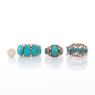 THREE NATIVE AMERICAN TURQUOISE AND SILVER BRACELETS