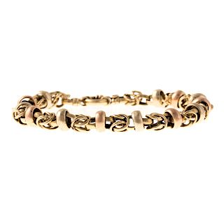 A Ladies 14K Yellow & Rose Gold Link Bracelet
