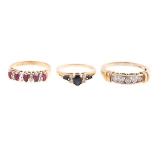 A Trio of Sapphire, Diamond & Ruby Rings in Gold