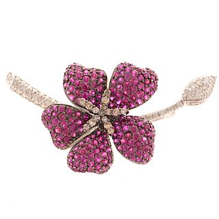 A Ladies Ruby and Diamond Brooch in 18K