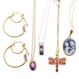 A Selection of Ladies Gemstone Jewelry in Gold