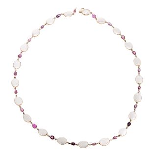 A Ladies Moonstone & Ruby Necklace in 14K Gold