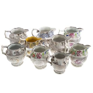 Eight Staffordshire Silver Lustre Jugs