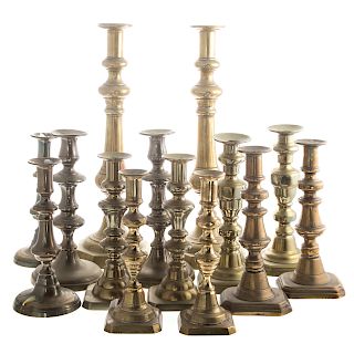 Seven Pairs Of Victorian Brass Candlesticks