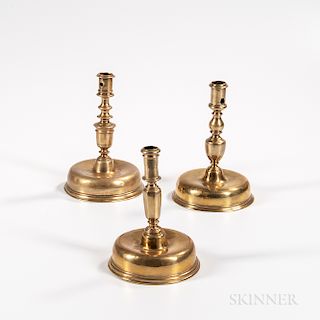 Three Dutch Brass Bun-base Candlesticks