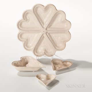 Four Molded Staffordshire Salt-glazed Stoneware Heart-form Pastry Molds