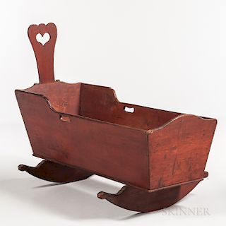 Red-painted Cradle with Heart Cutout