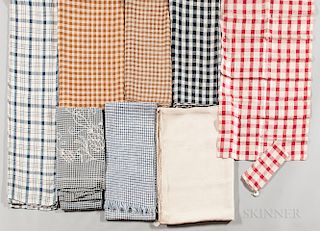 Eight Mostly Checked Linen Textiles