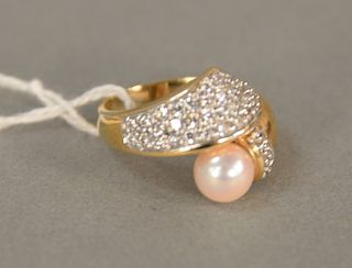 14K gold ring set with pearl and cz melee, total weight 6.6 gr.