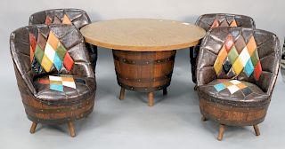 Five piece Matthew Brothers barrel style game table along with four chairs upholstered in decorative vinyl all made from oak whiskey barrels, Liverpoo