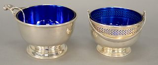 Two sterling silver sugars each with cobalt liners, ht. 2 1/2 in., dia. 3 3/4 in., troy ounces: 7.8. Provenance: An Estate from 5th ...