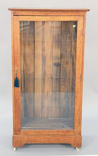 Oak one door cabinet, ht. 55 1/2 in., wd. 27 1/2 in.