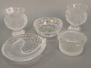 Five piece Lalique smoking group to include a pair of match or lighter holders (ht. 14 1/2), frosted shell decal ashtray, swirl asht...