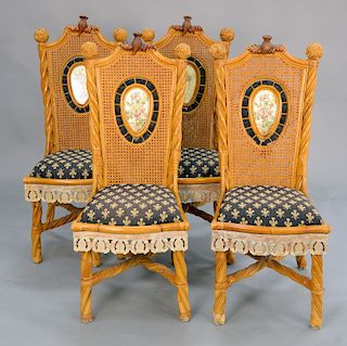 Set of four Mackenzie Childs woven side chairs (some wear). ht. 44 in.