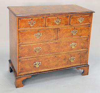 George III style walnut oyster veneered three over two over two drawer chest. ht. 36 in., top: 20" x 41".