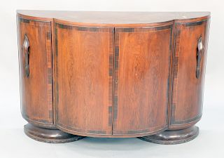 Danish art deco rosewood sideboard with shaped top with four doors. ht. 36 in., top: 19" x 55".